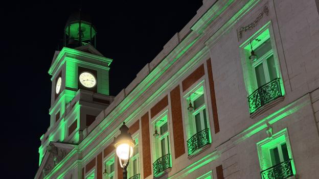 La Comunidad de Madrid ilumina de color verde la Real Casa de Correos con motivo del Día Internacional del Síndrome Phelan-McDermid
