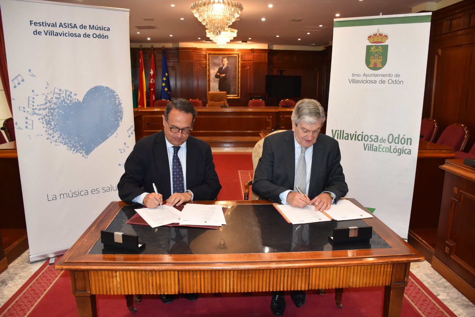Texto Alternativo: El Ayuntamiento de Villaviciosa de Odón y Asisa renuevan el convenio de colaboración para la celebración de la XVII edición del Festival de Música